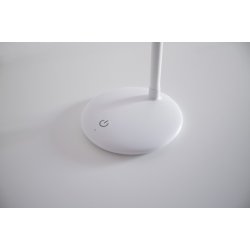 Foden af Basis-bordluplampen, med betjeningsknappen i fokus.