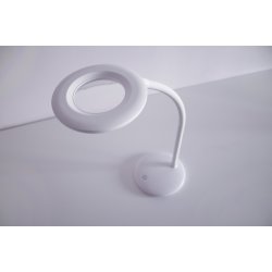 Nrbilledet af lampehovedet med linsen p Basis-bordluplampen.